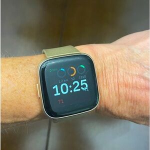 Fitbit smartwatch Versa 2. Comes with 2 bands and charger. Still works perfect
